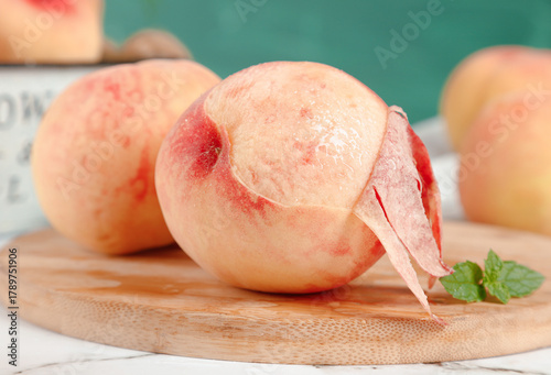 Fresh Peeled Yangshan Peaches from Wuxi on Wooden Board - Juicy Summer Fruit
