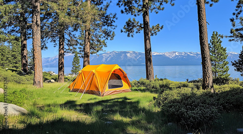 Bright orange tent by blue lake with pine forest and snowy peaks, peaceful camping video with clear water light and mountain view in 4k.