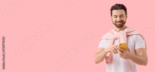 Handsome man using mobile p...
