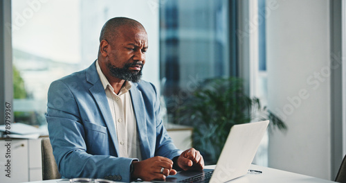 Obraz na plátně Financial advisor, laptop and black man with stress, thinking and problem solving for inflation