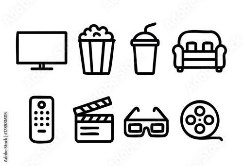 A cozy setup for a movie night at home includes a television, popcorn, a drink, a couch, a remote control, glasses, and a film clapperboard, all ready for entertainment.