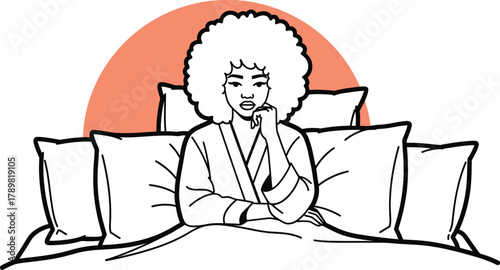 Pensive woman in bed with afro hairstyle wears robe, thoughtful pose