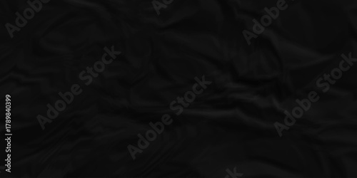 Dark black crumpled paper background. old paper wrinkle texture pattern. cardboard wrinkled arts craft and Seamless black crumpled paper.	