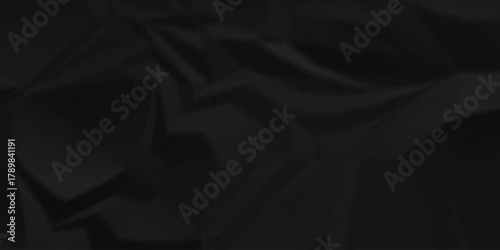 Dark black crumpled paper background. old paper wrinkle texture pattern. cardboard wrinkled arts craft and Seamless black crumpled paper.	