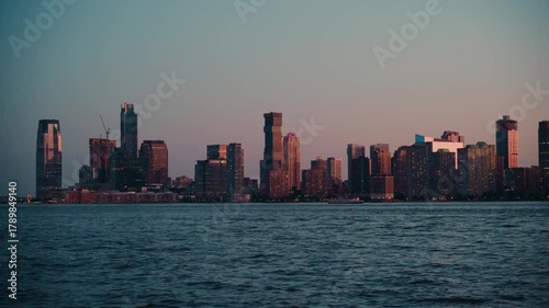 Jersey City Skyline at Sunset Across the Hudson River — Cinematic Urban Waterfront View