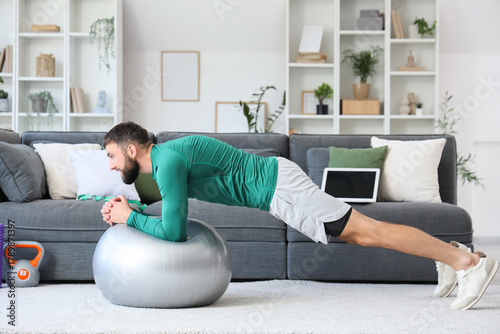 Sporty young man exercising...