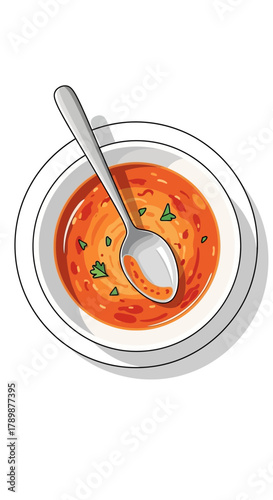 Bowl of tomato soup with a spoon on a white background.