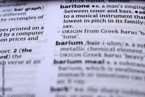 Close Up Of English Dictionary Page With Word - baritone