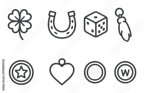 Monochrome lucky charm icons: shamrock, horseshoe, dice, rabbit foot
