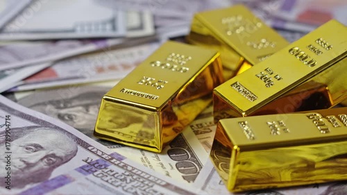 100 dollar bills with gold bars. Wealth saving concept