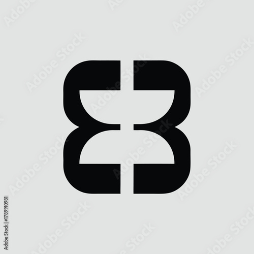 Black symmetrical abstract logo resembling a stylized number "33" or mirrored shapes on a light gray background, conveying modernity and balance.