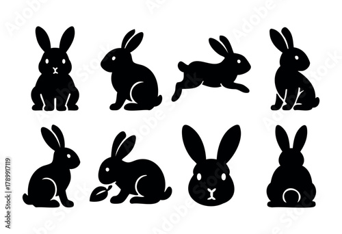 Set of eight black silhouette rabbit icons in different poses, including sitting, running, and eating. Perfect for Easter, children's illustrations, or design projects needing a simple, bold rabbit im