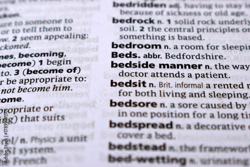 Close Up Of English Dictionary Page With Word - bedside manner