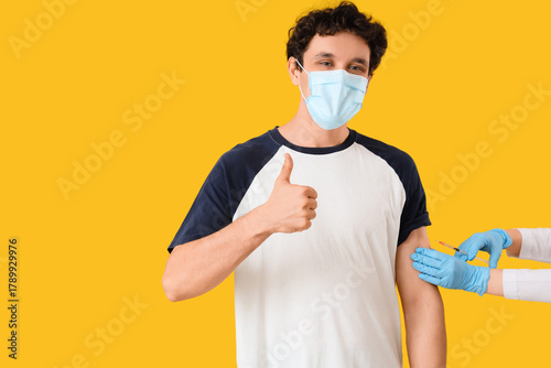 Young man in medical mask r...