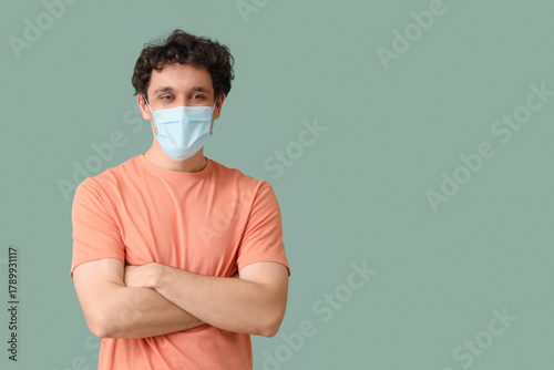 Young man in medical mask o...