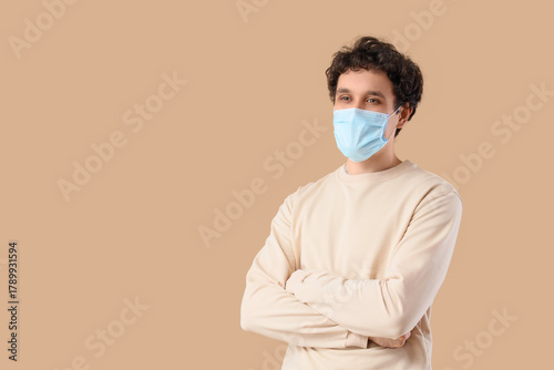 Young man wearing blue medi...