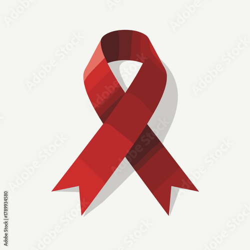 Symbolic Red ribbon representing support for social issues and causes, shown against white background. Red ribbon is meant to show symbolic solidarity during special events or campaigns.