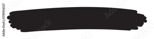 Black paint brush stroke with a textured grunge effect. Hand drawn ink smear or artistic daub for creative design, banners, and backgrounds with available copy space