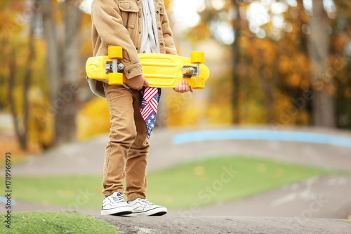 Little boy with skateboard ...