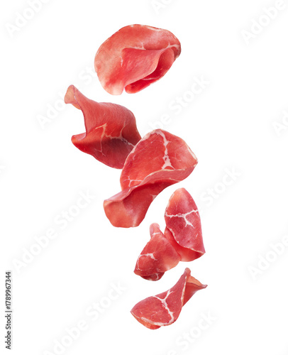 Slices of fresh prosciutto ham isolated on transparent background