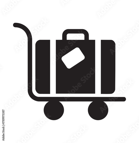 Black icon of a suitcase on a luggage cart trolley travel