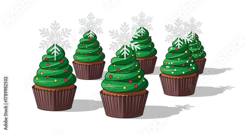 Festive christmas tree shaped cupcakes decorated with colorful baubles and snowflake toppers on a white background
