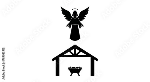 Black silhouette of an angel with wings and halo above a manger with a baby jesus in a stable