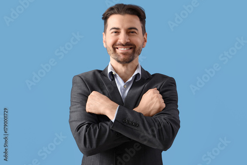 Young businessman using sig...