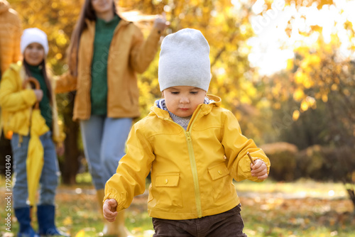 Cute little baby in autumn ...