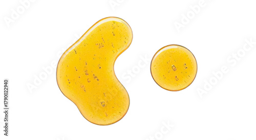 Принти на полотні Golden textured cosmetic serum drops or natural honey elixir with shimmering par
