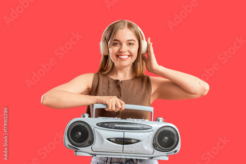 Young woman in headphones w...