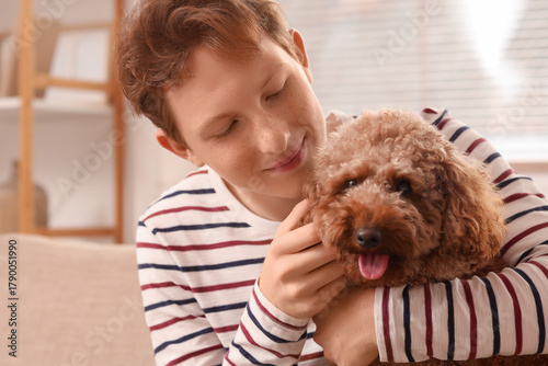 Young man hugging cute Toy ...