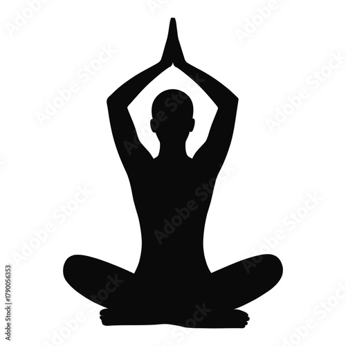 Silhouette of person in yoga lotus pose with hands clasped above head Keywords: yoga, meditation