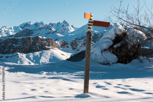 Snowy mountain range over silent white valley