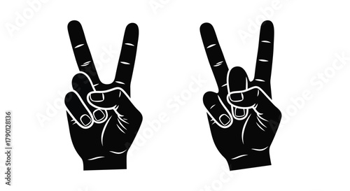 Two hands displaying the peace sign and rock on hand gesture