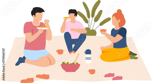 People enjoying outdoor picnic eating and drinking