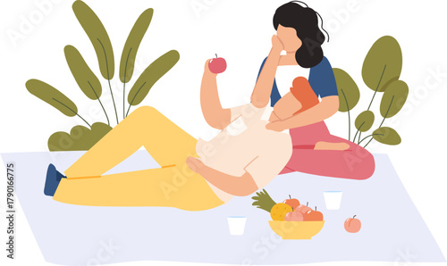 Couple relaxing during a picnic in nature