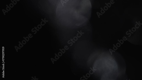 Optical glow lens flare bokeh transition overlays background. White lens flares Light Leak overlay on black background. Spherical Optical Light abstract background. Light Leaks footage