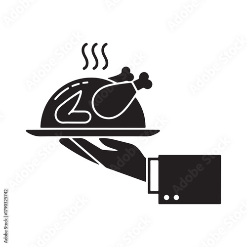 Hand serving hot roasted chicken meal on platter