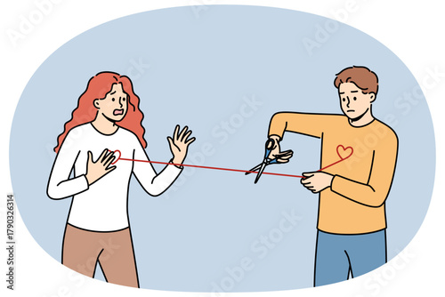 Man gets rid of love addiction and attachment to girlfriend, cuts rope connecting hearts. Problem of love addiction and toxic relationships has led to need to separate or break connection