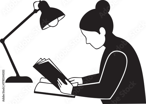 Silhouette of a businessman or woman working on a laptop at an office desk 