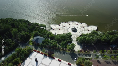 Aerial view of the Golden Buddha statue at Liudingshan Cultural Tourism Area in Dunhua City, Jilin Province, China. Massive golden statue overlooking Zhengjue Temple and facing the Changbai Mountain