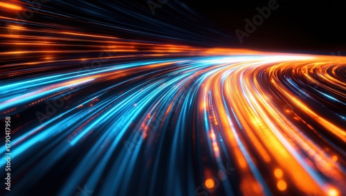 A vibrant abstract image featuring flowing lines of blue and orange light, creating a sense of motion and energy.