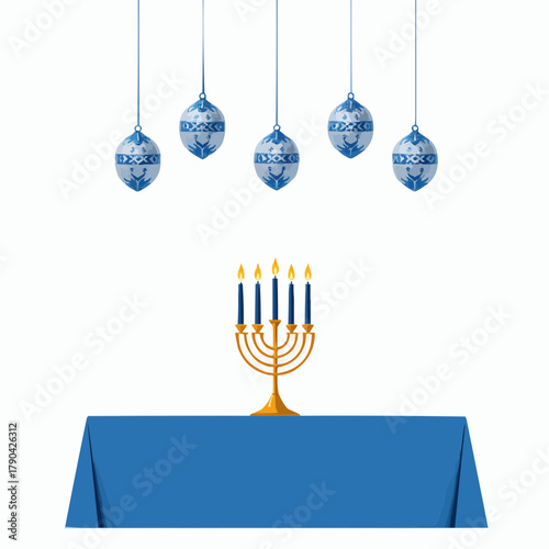 Blue and silver decorations hanging above table with menorah candles  