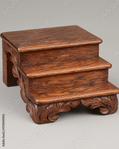 Ornate Wooden Stool with Intricate Carved Design on Light Background