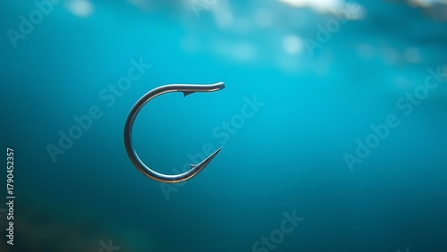limnetic. Close-up of a metallic fish hook submerged in clear blue water. wildlife magazines, conservation campaigns, designed for eco-tourism storytelling, celebrates biodiversity.