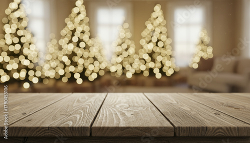 Rustic wood table foreground with glowing white and gold bokeh from holiday trees