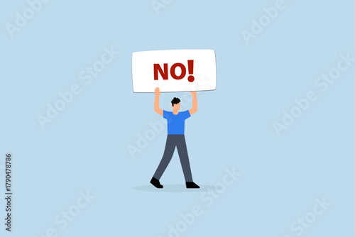 Say no, Businessman displays sign that reads NO, conveying strong sense of rejection.