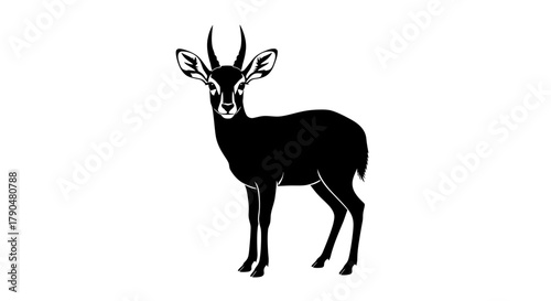 Black silhouette of a standing antelope with horns on white background