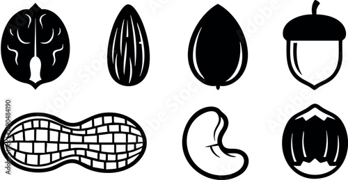 Various nut silhouettes including walnut almond peanut cashew acorn hazelnut vector illustration black and white natural food icons
